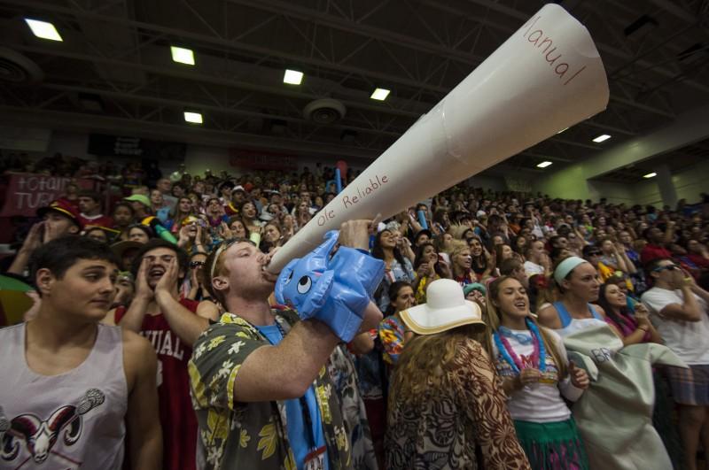 Sam Coryell(12) uses "Ole Reliable" to cheer up the class of 2014. Photo by Jack Steele Mattingly