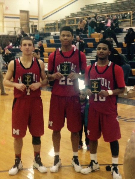Jarrett Harness (12, #4), Dwayne Sutton (12, #22) and Ja'Kory Freeman (12, #10) all received All-Tournament honors for the District 25 tournament. Photo by, Jack Grossman