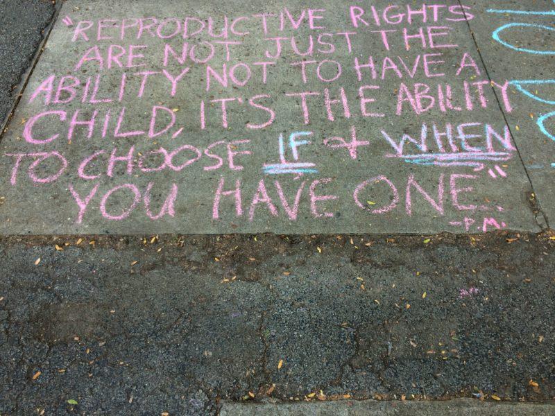 Words in favor of reproductive rights for women written on Manual's courtyard. Photo by Maya Joshi