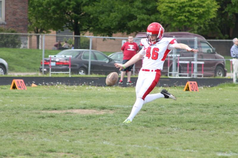 Chris Roussell (11, #46) punts to start off the game. Roussell has been Manual's starting placekicker for the past two seasons, and may replace the graduating Jake Rist (12, #8) as punter next season.