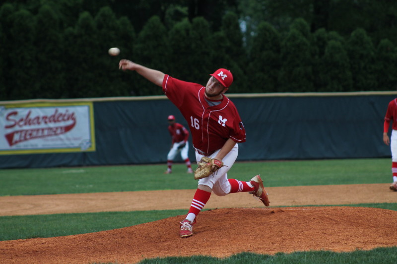 Brian Hoffman (11, #16) throws out a pitch in the fifth inning. Hoffman acted as the closer to seal the perfect game after the coaches decided to rest Olson's shoulder.