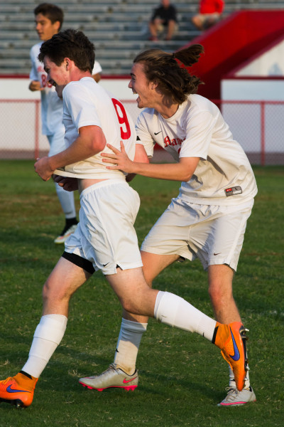 Lucas Gibson (12,#2) celebrates with Dylan Barth (11,#9) for Dylan's first goal of the game. Photo by Luke Smith.