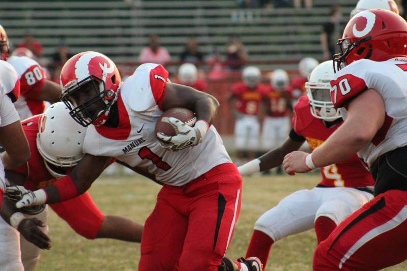 Reese West (12, #1) scores a 40 yard touchdown on the carry. Photo by Kate Hatter 