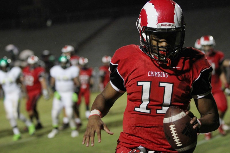 Receiver Jailen Cater (11, #11) after catching a one yard touchdown pass to give Manual a 28-0 lead in the second quarter. Photo by Meaghan Sutton.