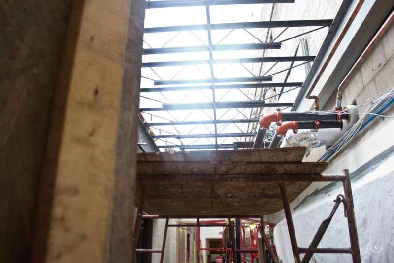 Construction hole in the ceiling above the back hallway towards the canteen Wednesday Aug. 17, 2016